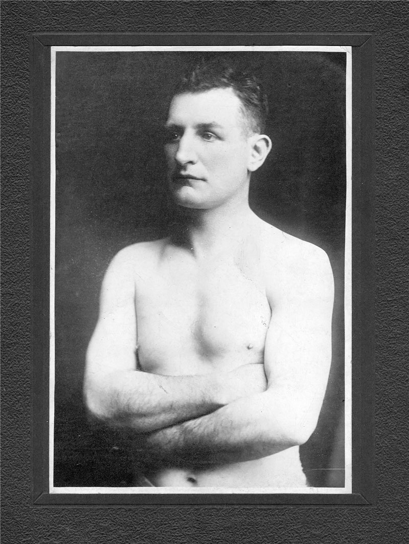 Shine Reed of Stephenson County, Ill. The boxer was a friend of the Woods family in Freeport. He once won a match with "Cyclone" Johnny Thompson, who later fought the great Middleweight Champion Stanley Ketchel in 1910. This is an original photograph given to the family by Shine. View full size.