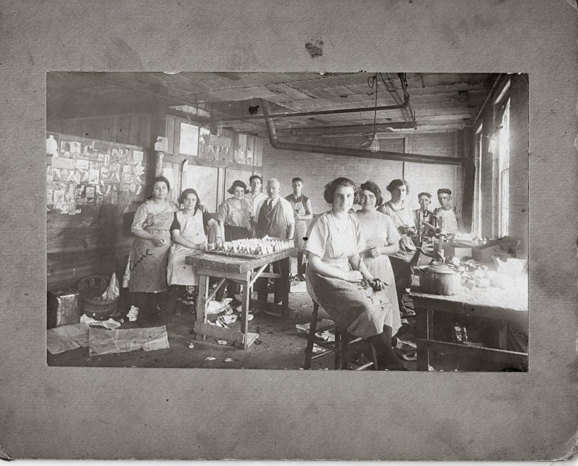 This picture was taken in an unidentified Brooklyn, N.Y., shoe factory around 1920. Pictured on the far left side is Anna Maggi of Brooklyn. View full size.
