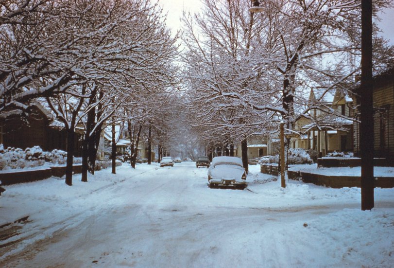 A snowy day in Coshocton Ohio sometime in the early 1950's.  This was probably North 9th Street, looking north with Oak Avenue on the right. Taken by my grandfather. View full size.
