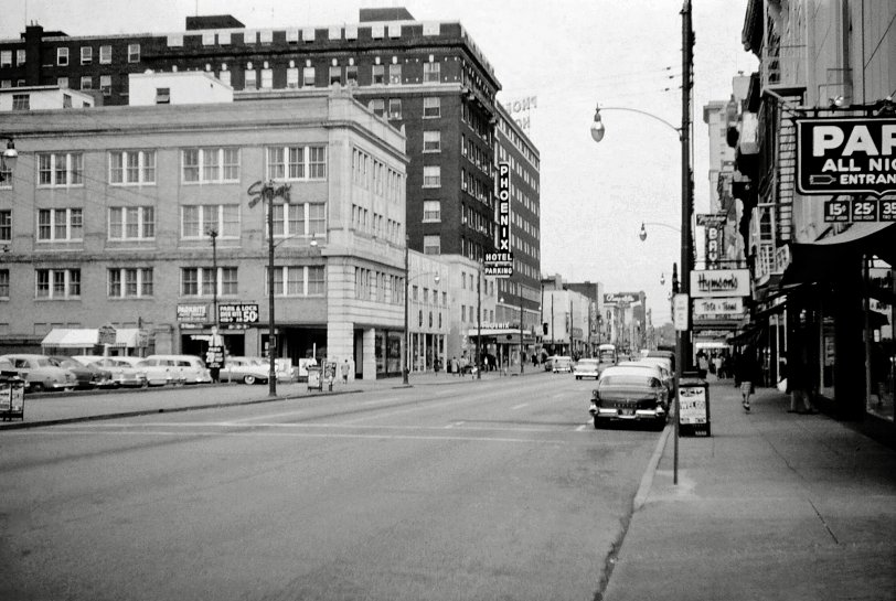 Taken in downtown Lexington, Kentucky in the mid-1950's.  My grandfather was good friends with another store owner who kept a racehorse at Keeneland Raceway.  Once in a while they would take the train down from Ohio to watch his horse run and visit my dad who was attending the University of Kentucky at the time. View full size.
