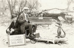 South Trimble and Buddie Allan of Kentucky riding the Florida Gatormobile 1922 Model in Miami, Florida.