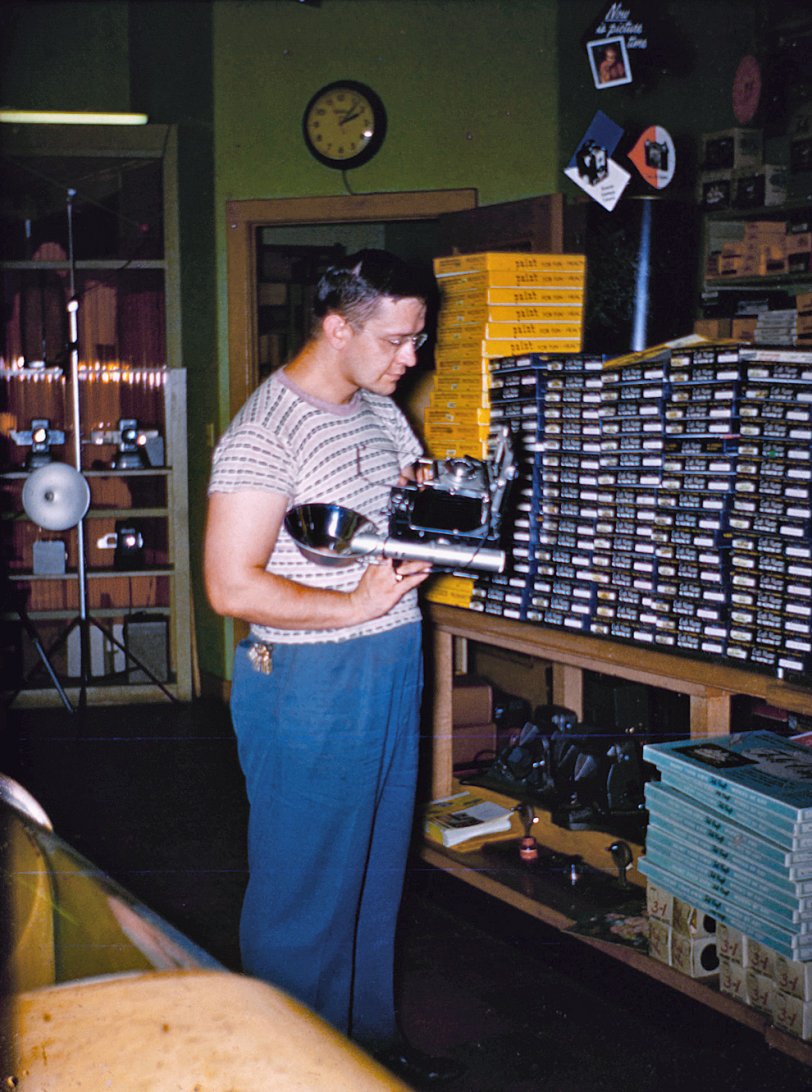 Found this in a collection of stereo slides when we were cleaning out my in-laws' house.  This is my father-in-law, who came back from WWII and either opened or worked at a photo store in Holyoke MA for a few years, before he started working as a plant repairman for some the manufacturing companies in the Pioneer Valley.  This was probably taken in the early 50s and yes, it's Kodachrome.
He had a lifelong interest in photography and we are lucky to have many pictures of my wife's family. I have the stereo camera which was probably used to take this.  It's a Revere Stereo 33, and it suffers from a poorly designed film advance mechanism.  I did have it repaired once, and I managed to take a couple of rolls of stereo slides of my family, before the film advance failed again.
I'm not actually sure if this is a Speed Graphic, but it's a Graphic of some kind.  All we found when we emptied the house was the flash and some film holders.  The camera must have been sold. View full size.
