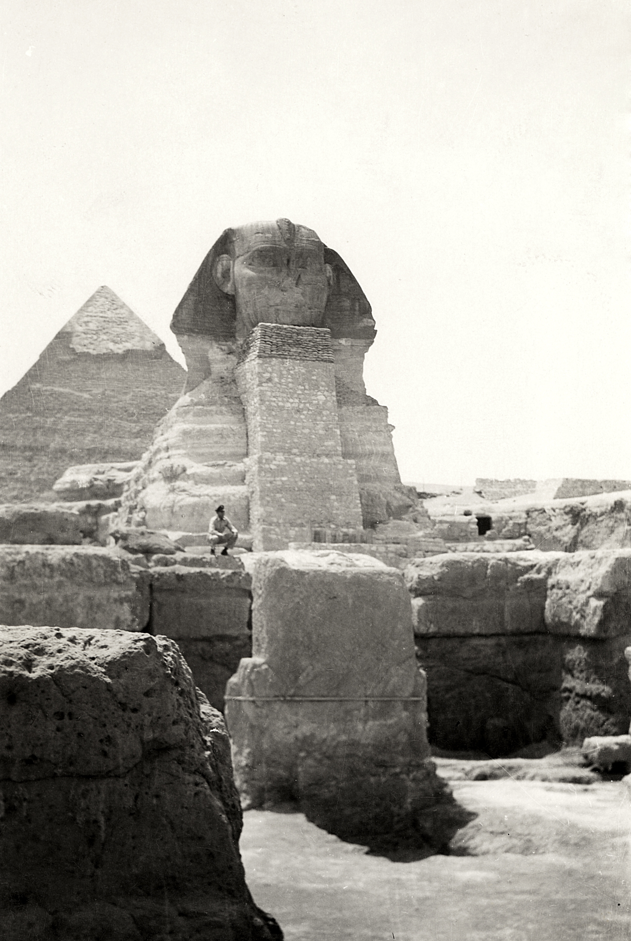 Here's my grandfather at the Sphinx in May 1945, plus or minus a month or so. I've recently run across a stash of his photos and am slowly working my way through scanning them. Sadly, he wasn't much for labeling his photos unless these have fallen out of an album I haven't uncovered yet, so beyond some of the more obvious landmarks, it's difficult to impossible place the photo in time and space. 

This one's easy though. As a C-47 pilot (https://www.shorpy.com/node/4003) based in Naples at this point, he made several trips to various North African destinations, apparently with enough time to take in the sights now and again. His photographer is never identified, but seems to put a little more thought into the composition than your average snapshot-taker. 

I showed this photo to my wife. "Where _is_ he?" she exclaimed. I want to believe that she was really wanting to know more about _why_ he was there than his actual location. I told her it was the Luxor in Vegas. 
