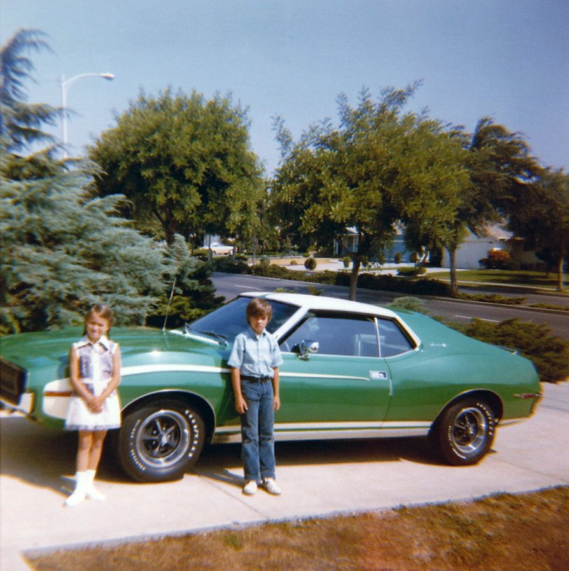 Photo of my sister and I next to our father's 1972 AMC Javelin. We were living on Calaroga Ave in Hayward, California. Photo was taken on a 126 camera. View full size.
