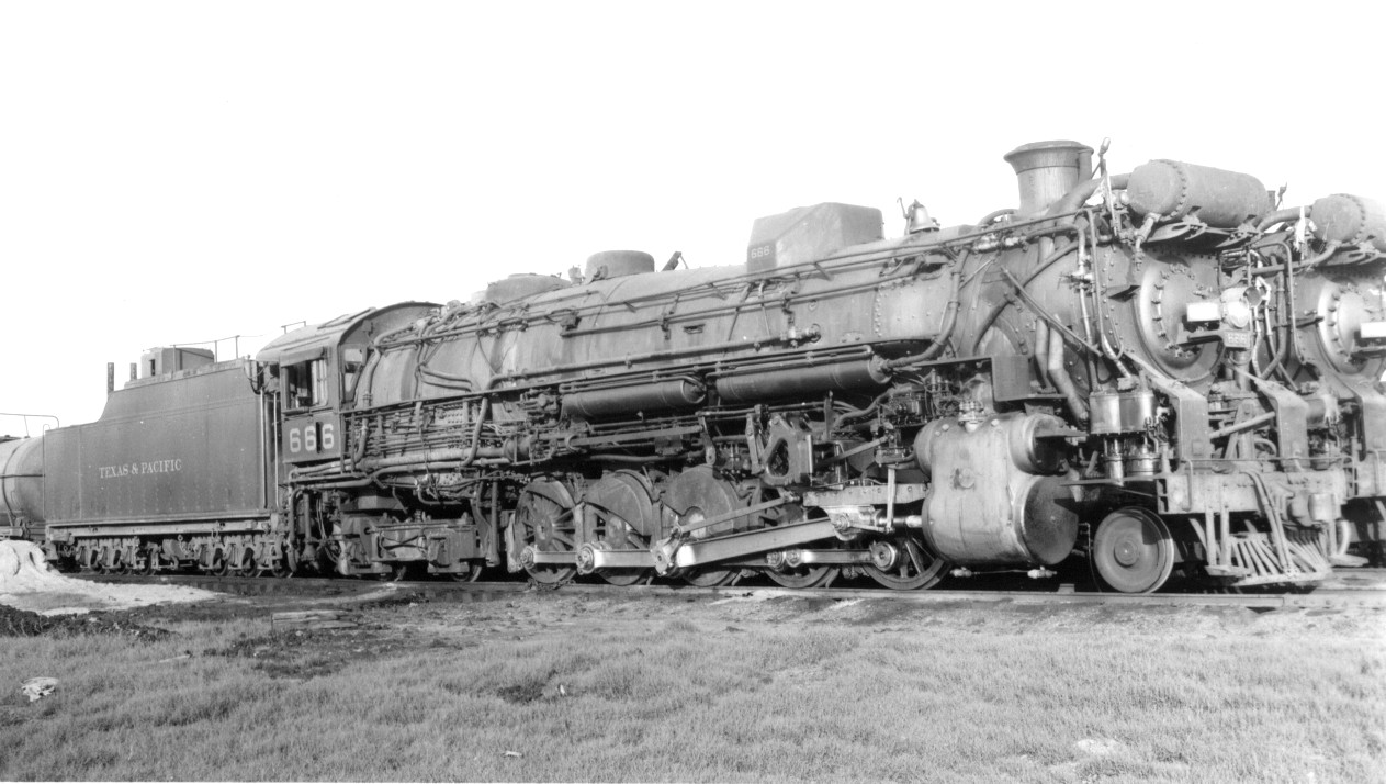 Hard to believe that in the days before email locomotive portrait photographers had their own photo-sharing network, trading pictures among each other to fill in gaps in their own negative collections.  All were valuable, but unusual number combinations like this were highly prized.

Texas & Pacific Railroad Texas-type #666 is at Shreveport, Louisiana in September, 1949.  T&P engine crews did in fact refer to this locomotive as "The Devil Engine". View full size.