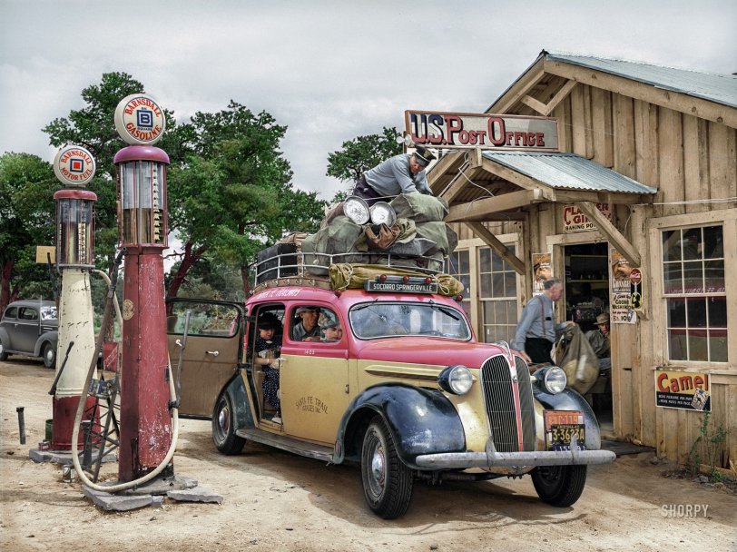 June 1940. "Stage in front of the post office at Pie Town, New Mexico. This stage comes through daily except Sunday. It takes in cream for the Pie Town farmers to Magdalena and Socorro and then returns the empty cans." Photo by Russell Lee.
Colorized version of this Shorpy old photo. View full size.

