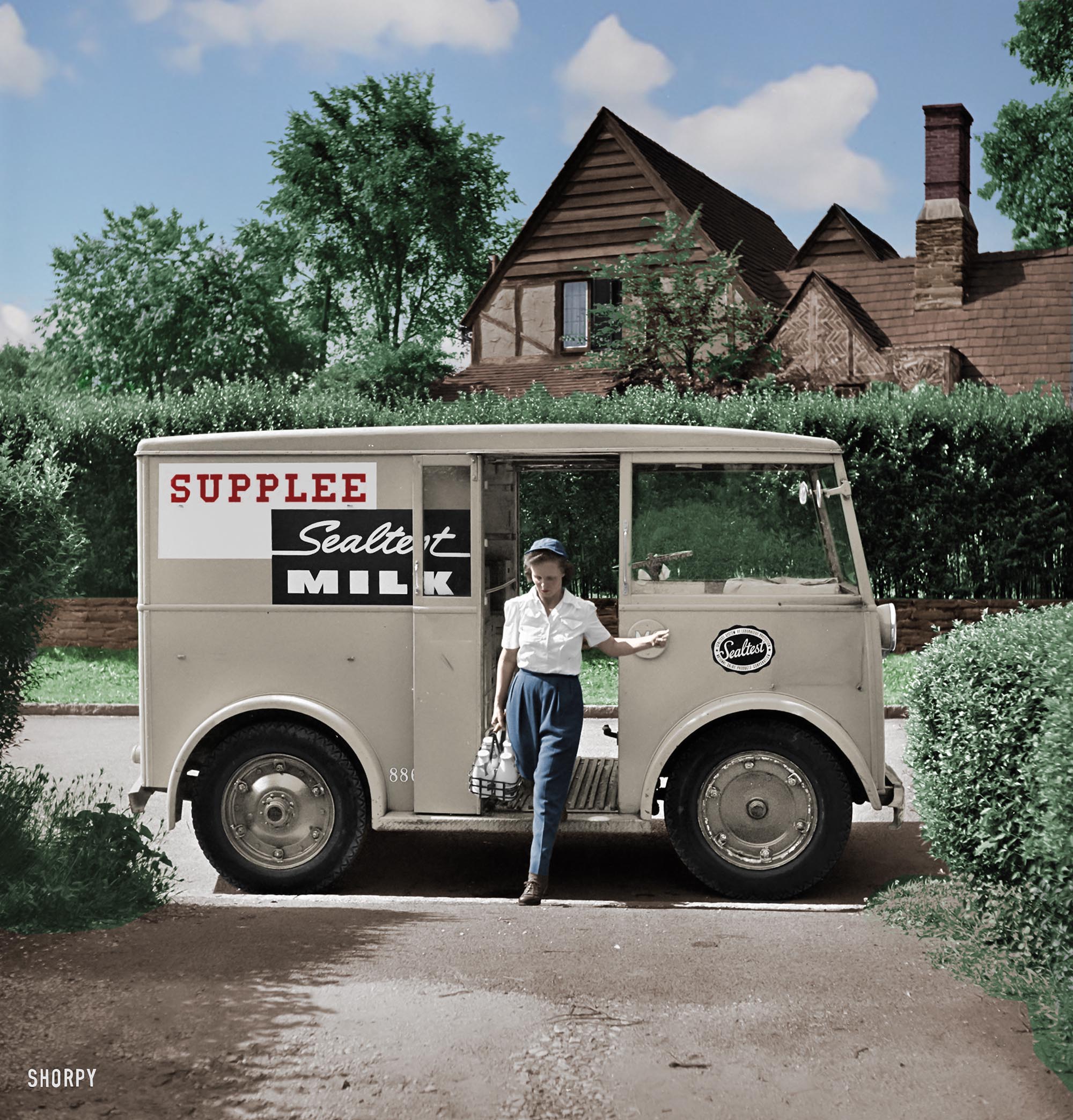 Colorized version of this photo. The good old days of home delivered milk (and cream). How many people remember this? Unfortunately I do from the late 1940s or early 1950s.