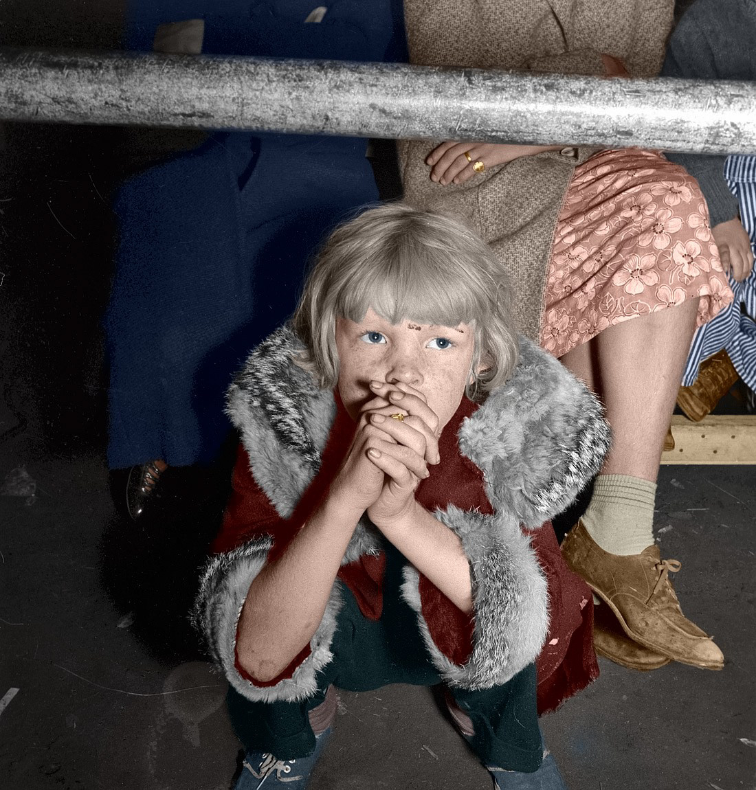 Colorized from Shorpy's files. November 1938. "Kern County, California. Cotton picker's child listening to speeches of organizer at strike meeting to raise wages from 75 cents to 90 cents a hundred pounds. Strike unsuccessful." Photo by Dorothea Lange. View full size.