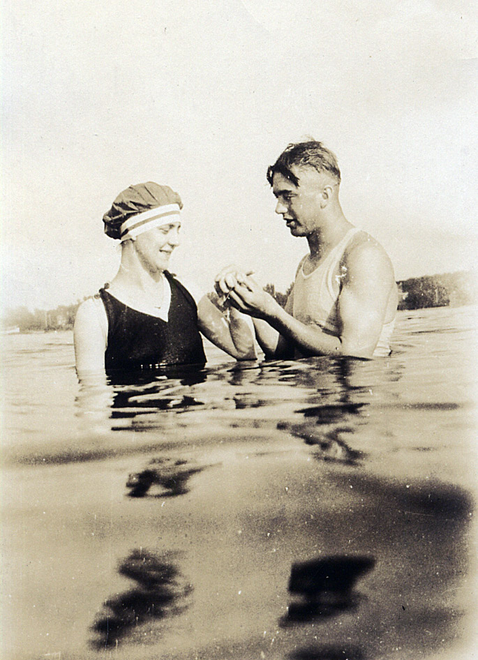 Another one of my Instant Relatives photos.  I call this one "The Proposal" as that was my first thought when I saw this pic.  From the style of her bathing suit & cap and his haircut, it's likely that this was taken in the teen's or early 1920's.