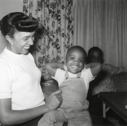 Here is a snapshot from an album I purchased at an estate sale. I believe it was taken in 1957 in Washington State. The boy looks like he's being tickled. View full size.
(ShorpyBlog, Member Gallery)