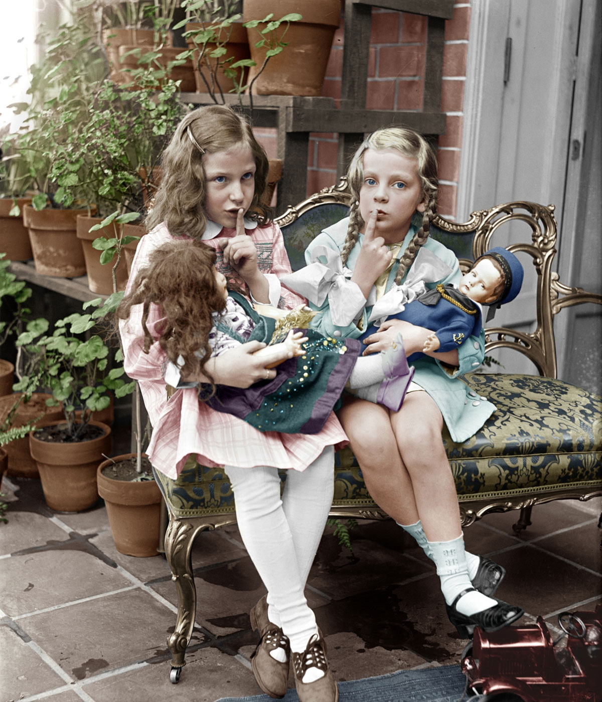 Two Young Girls With Dolls (between 1909 and 1923) National Photo Company, Library of Congress. View full size.