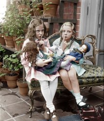 Two Young Girls With Dolls (between 1909 and 1923) National Photo Company, Library of Congress. View full size.