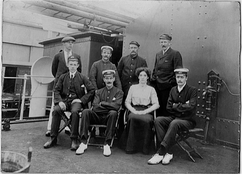 My great uncle John Tocher, seated at right, aboard the Steam Ship Heronpool, circa 1910. Engineer, designer of the Portobello Wave Pool, Edinburgh. He went on to be a successful engineer. My new-found cousin, Mags, John's grand-daughter sent me this photo. View full size.
Uncle John narrowly missed death in the sinking of the submarine HMS Thetis on its maiden voyage. Uncle John suffered from claustrophobia and decided not to go aboard. It sank, with 99 lives aboard lost. Two men managed to escape through a hatch and four others died trying the same escape route.
"On June 1, 1939, Thetis prepared to make its maiden voyage.
The voyage was to be a test run and dive in the home waters of Liverpool Bay.
Conditions on board were extremely cramped, with the submarine carrying 103 men - twice the number she was designed to carry. Thetis being launched Many aboard were engineers from Cammell Lairds. Only 69 of Thetis's crew were sailors, the rest were mainly engineers from Cammell Laird. Laird's workers were offered the opportunity to disembark prior to the dive, but all chose to stay aboard."
For three days, those trapped inside the submarine waited for rescue before succumbing to the effects to carbon dioxide poisoning.
http://www.bbc.co.uk/insideout/northwest/series7/thetis.shtml
