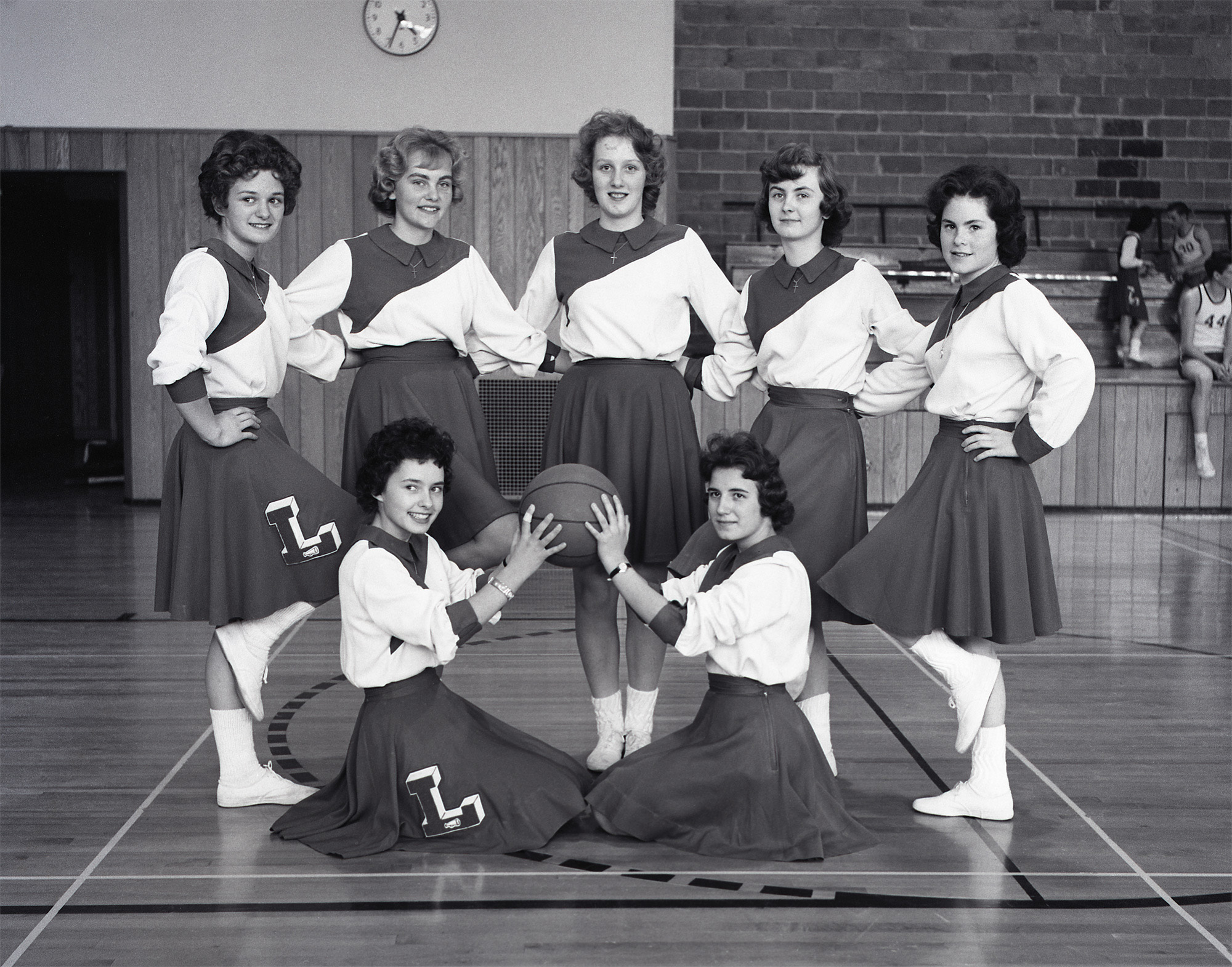 Cheerleaders from LaFargeville High School in LaFargeville, New York circa 1960. Medium format negative. View full size.
