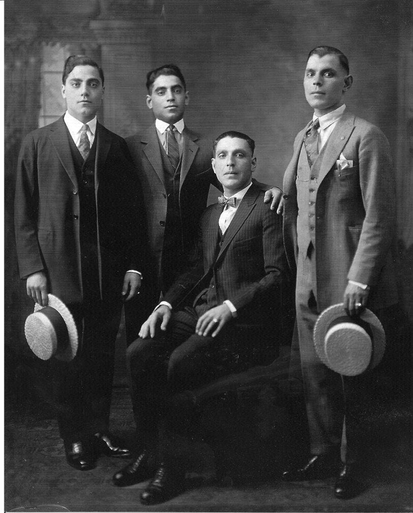 Pasquale, Vincenzo, Giuseppe and Pietro Vallinoto (left to right), taken shortly after my grandfather Vincenzo (b. 1902- d. 1985) arrived in New York City from Montemurro, Italy. He was the youngest of eight children and the last to leave his homeland for the promise of a better life in America. View full size.
