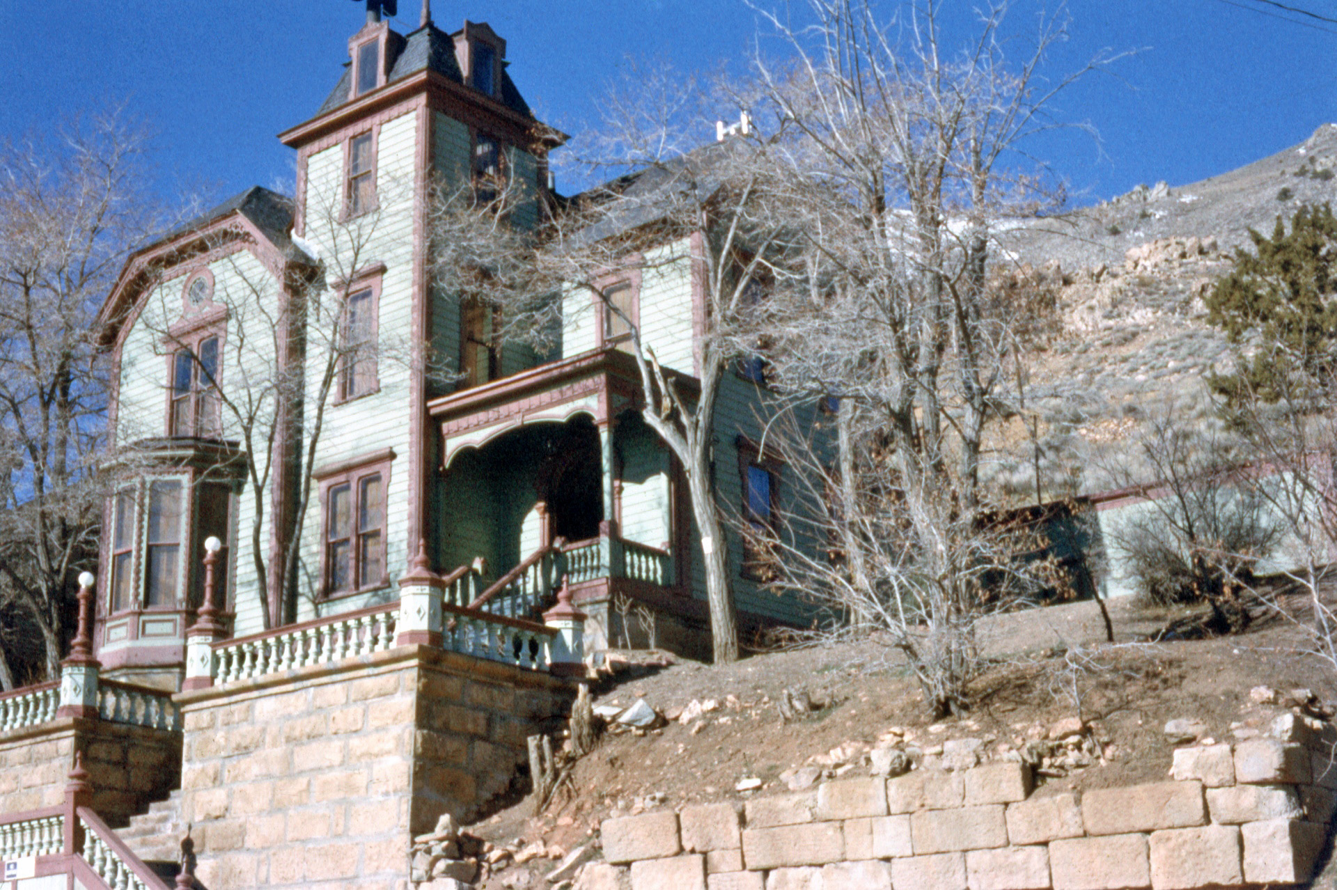 This old beauty was photographed on Anscochrome in 1959 at Virginia City, Nevada. It's hard to tell if it was abandoned when this photo was taken. View full size.