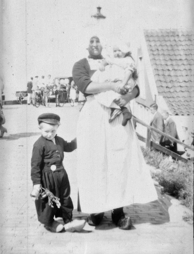 Volendam, Marken Island, Holland, a touristy fishing town (still is). My grandparents visited sometime in the 1930s. View full size.
