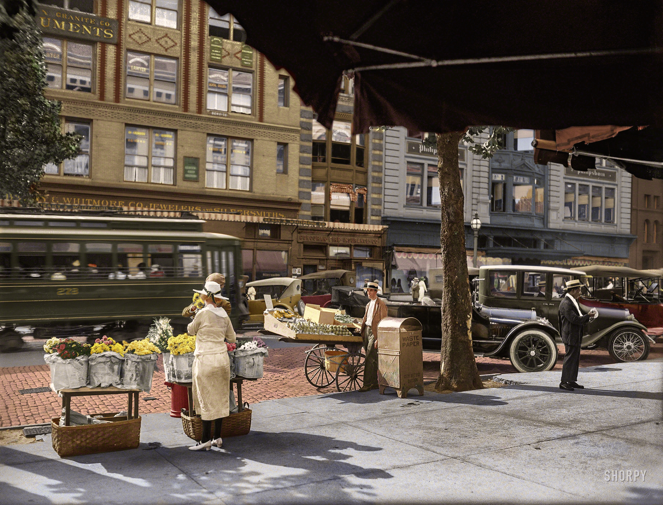A colorized version of this National Photo glass plate: Washington, D.C., circa 1921. "National Fruit Co. -- Eleventh Street N.W." View full size.