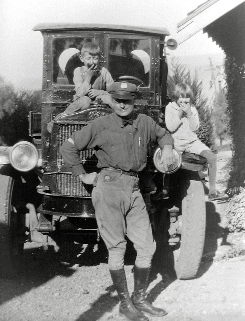 My grandfather W.W. Skinner was the first to acquire a balloon tire gas and oil delivery truck in San Luis Obispo, California. My father Don and aunt Margaret are on board. I like grandpa's tie, worn trousers and boots. Circa 1926. View full size.
