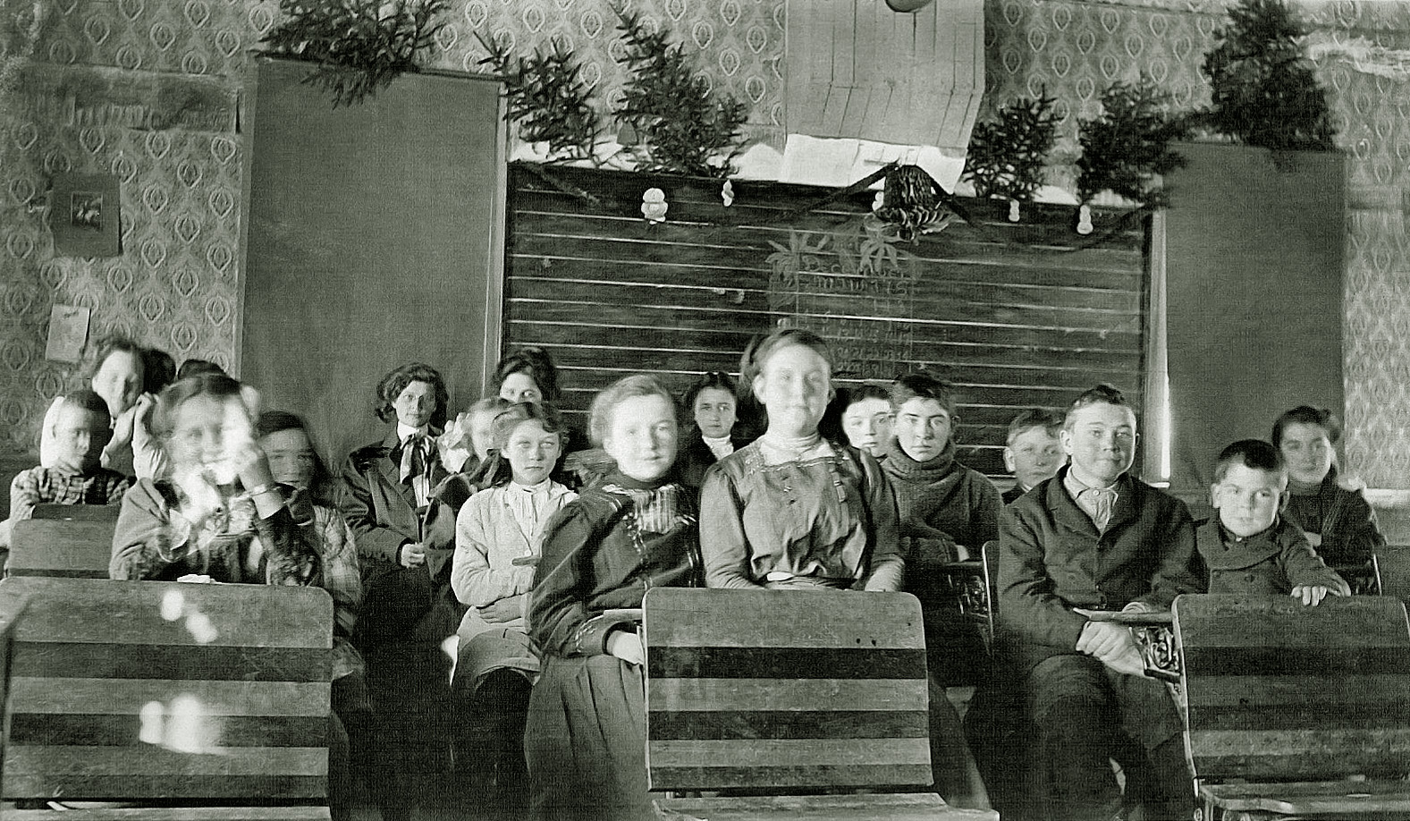 My father, second from right, in one room schoolhouse in White Lake Corners, New York in 1909. He was 8. View full size.