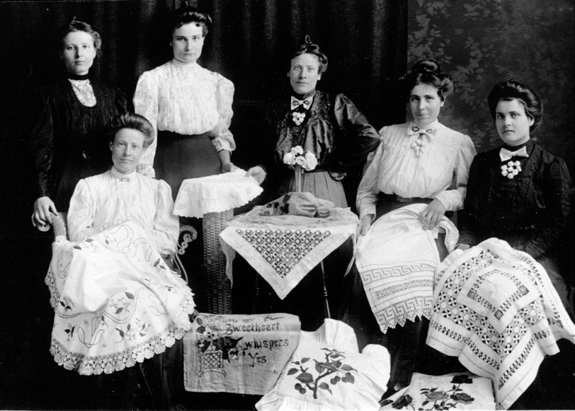 Millie, Tillie, Olga, Winnie, Marie, &amp;  Alvina Kruger. There were nine sisters total, but just these six showing off their handiwork. Best guess for date is 1912. Alvina on the far right was known as the hair stylist of the family and most likely did all of her sisters. They were from Minnesota. She was my wife's Grandmother and moved to western Nebraska shortly after this photo and started a family. Born 1890, died in 1964. View full size.

