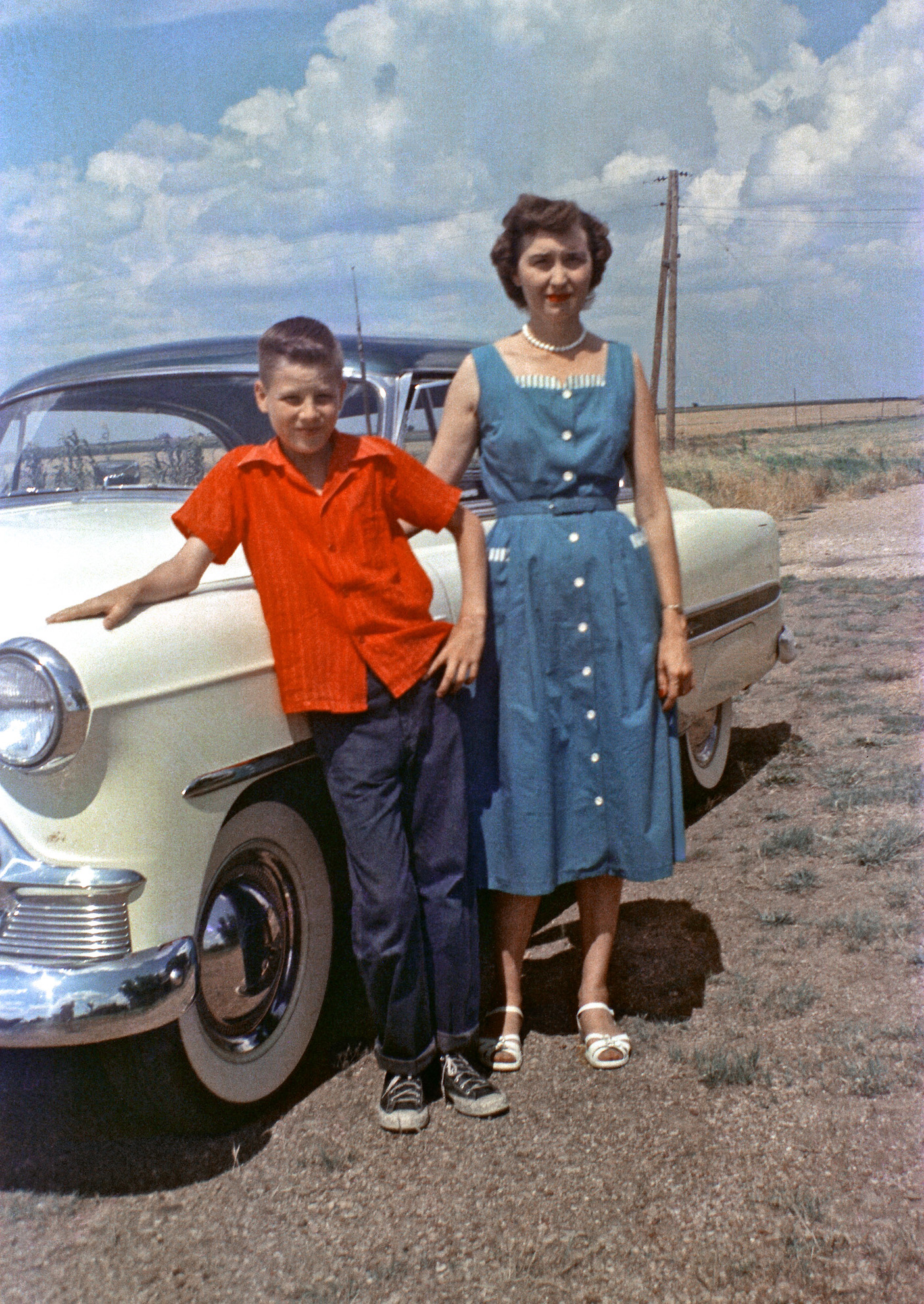 In a box of family photos I found some color negatives that were processed in 1954. This is Willie Mae Smiley (Aunt Jake) and Mike Etheridge, my Uncle Buck, in Parvin, Texas. [Note: the original image as submitted was backwards, so we've now flipped it.] View full size.