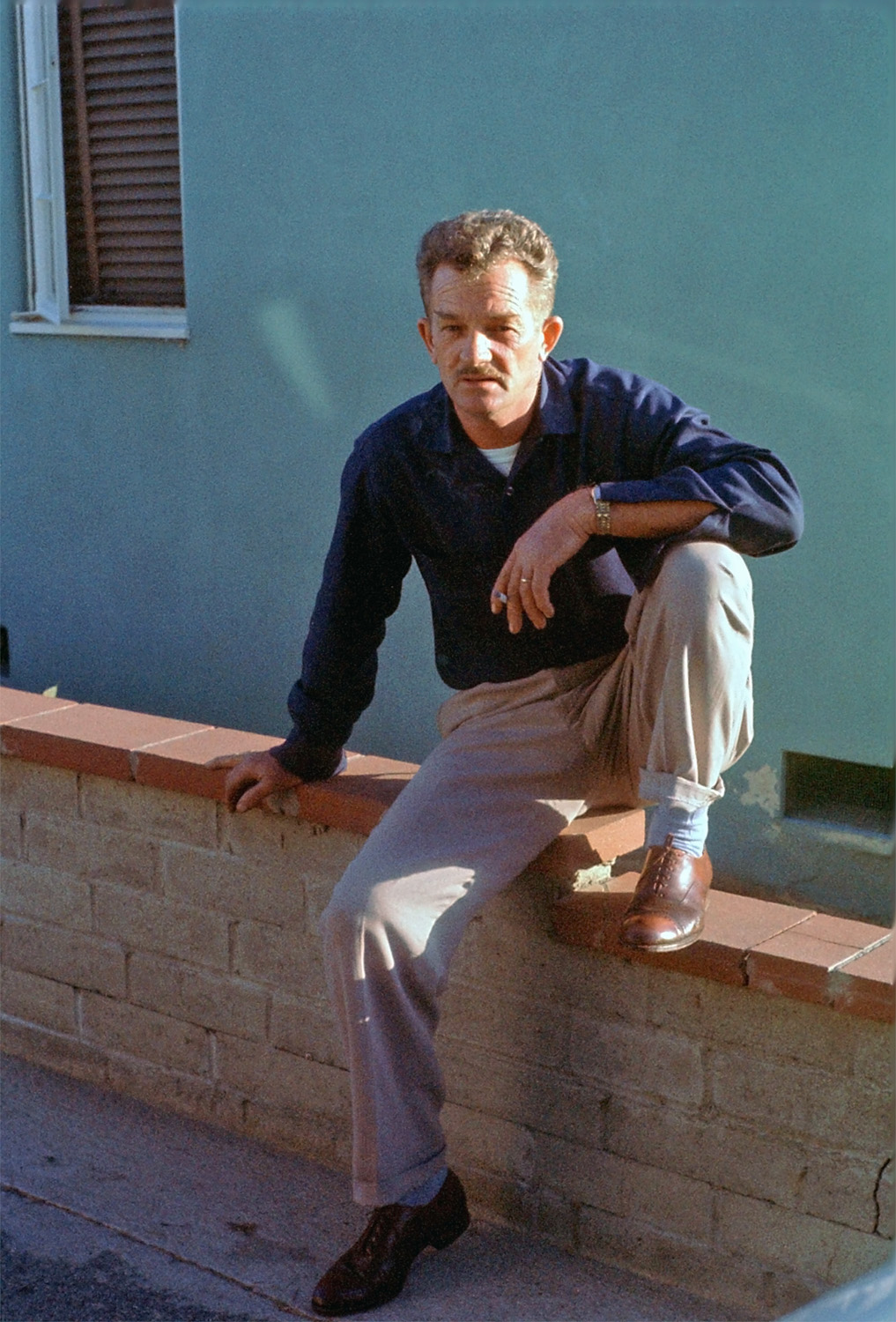 Late-1950s Kodachrome slide. My father-in-law Woodrow used to tell me he needed to be careful or he'd slice his finger on the knife pleat of his pants. Only his wit was sharper. He took this photo.
 View full size.