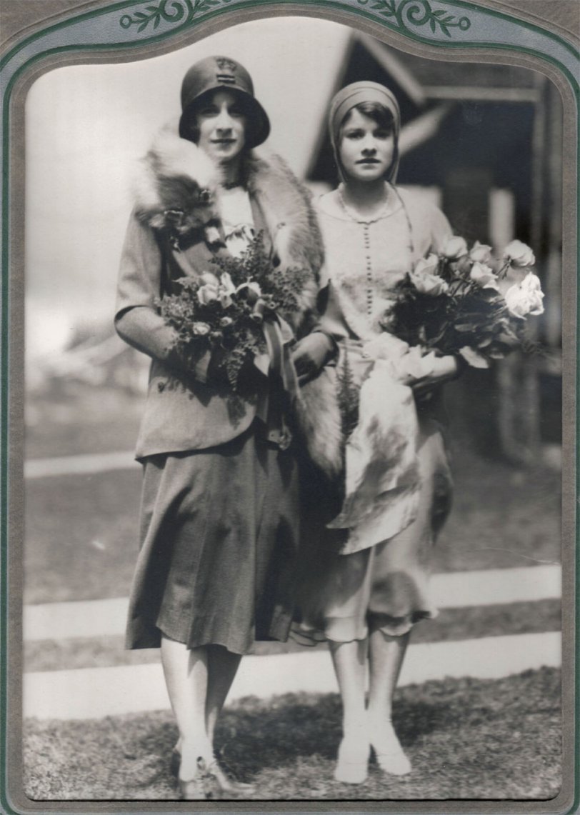 My grandmother Agnes Wells of Waterloo Ontario is turning 100 this month. This is a picture, likely shot in Waterloo, of her on the left and an unknown bridesmaid/maid of honor in 1929 or 1930. (might be a sister based on the nose). View full size.
