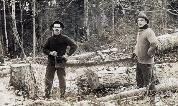 My wife's great-grandfather Albert Dostie, on the left, and his brother cutting down a few trees. Photo likely taken in the 1910's up in Quebec before they found their way to Maine. View full size.