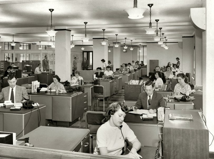 Anchor Insurance Co. in Los Angeles circa 1949. My parents met here -- Mom is on the right just behind the gent in the dark coat. View full size.
