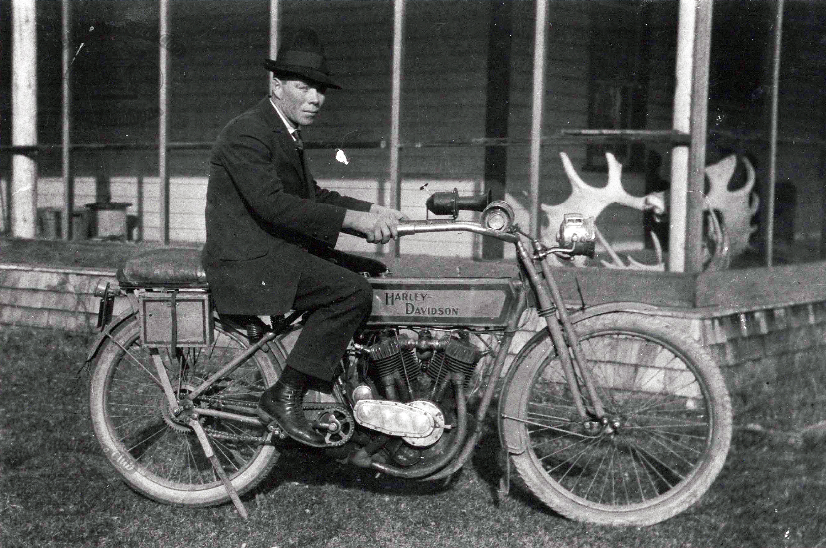 Archie Cox, a member of the Manitoba Motorcycle Club astride his circa 1913 Harley Davidson. Photo taken in 1918.