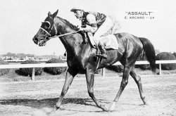Assault, winner of the 1946 Triple Crown. Owned and bred by King Ranch. Shown here later in his career under America's top jockey Eddie Arcaro. Photographer unknown. View full size.