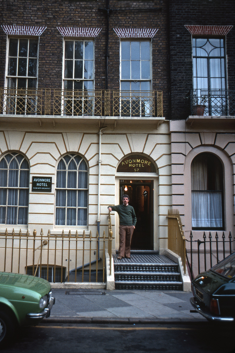 October 1976. I pose on the terrace of the Avonmore Hotel, 57 Cartwright Gardens, London WC1. Kodachrome snapped off by my friend using my late, lamented Konica Autoreflex T. View full size.