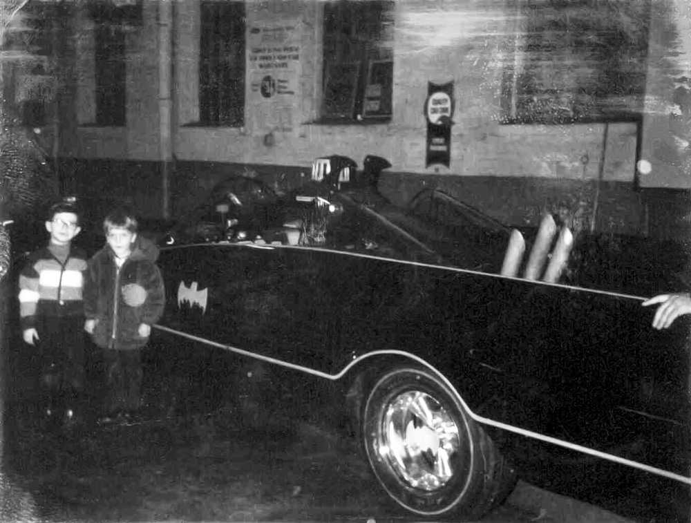 A most rare and unexpected opportunity, to get to see the Batmobile backstage at an Indianapolis auto show in 1967.  The  famous car was kept in 'storage' at a local Ford dealership, my cousin's father knew the owner hence our chance to get a 'private' viewing.

This Polaroid is the lone survivor of over a dozen taken that evening.  I'm the little geek in the hat should anyone be curious. 