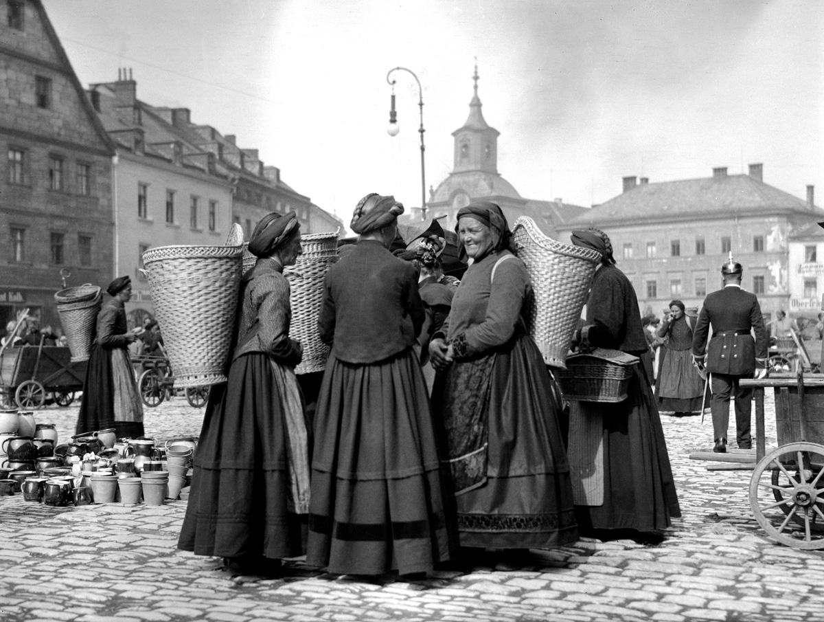 One of a series of images taken in Europe in 1904 by an unknown photographer. Scanned from the nitrocellulose negative. These women are possibly itinerant agricultural workers looking for employment; they don't seem to be selling anything. View full size.