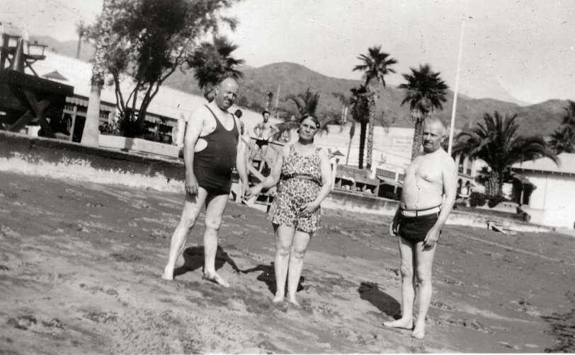 My great grandparents at the beach (my grandmother on my dad's side parents) I'm thinking sometime in the 1940's, not sure which beach (other than it's in Los Angeles County) They are the happy couple holding hands. I don't know who the other man is. View full size.
