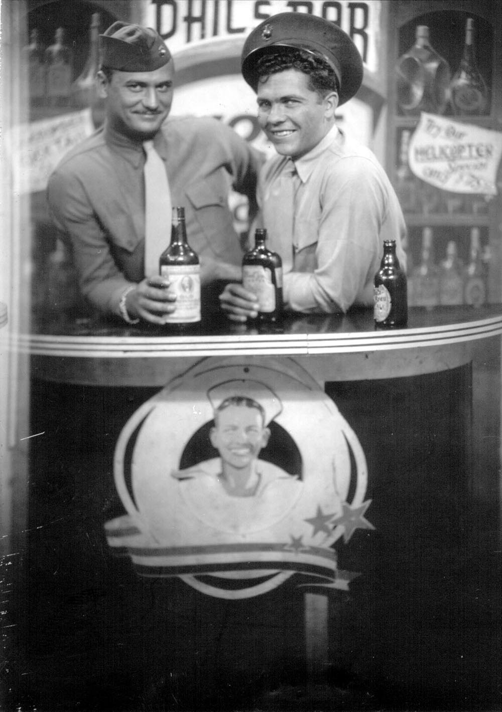 Kenneth Bell (left) during WWII. Exact date and location unknown. Kenneth married Joyce Blackburn.