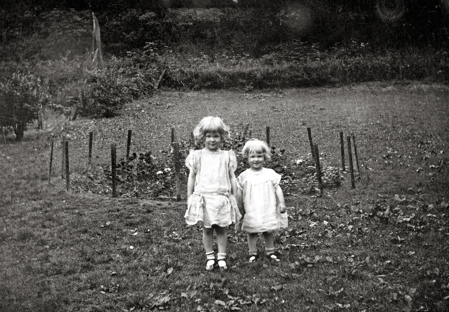East Liverpool, Ohio, 1924. The little girl is my mom, who turned 91 in August and the big girl is my aunt, now 94. Both still drive and get to the race track to play the slots twice a month. My great-grandfather had tennis courts and green houses on Dresden Avenue, and was an avid gardener too. View full size.