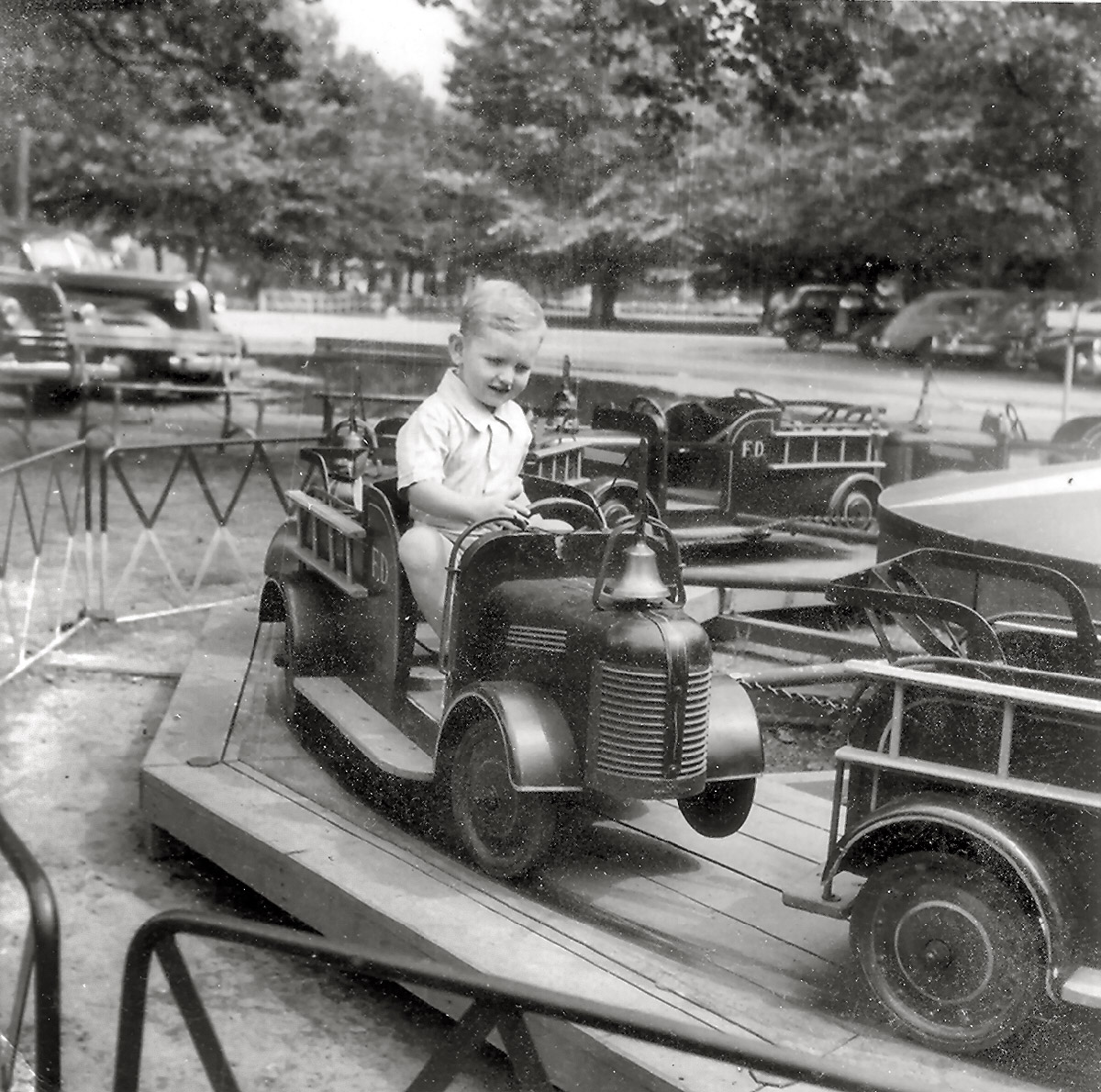 Sixty years have gone by since my father took this picture of me at Riverview Beach Amusement Park, then a popular spot on the Delaware River in southern New Jersey.  A lot of things have changed since August 1948, but I still enjoy amusement rides. View full size.