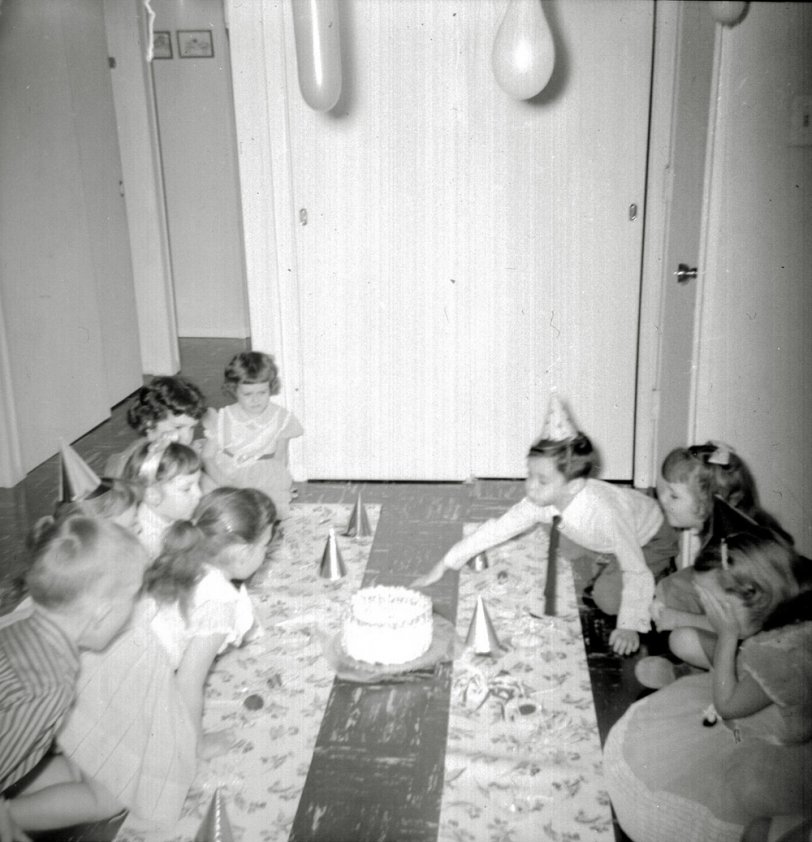 The reverse shot from the one I posted last week shows the star of the party: the birthday cake. It also shows that it wasn’t an ALL girl party.
