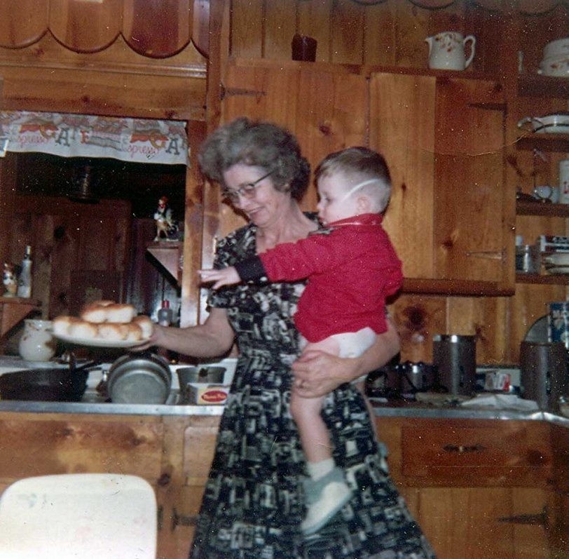 My Grandmother having a difficult time holding me and the plate as I'm reaching for a biscuit, 1966. She used to cook biscuits from scratch along with red eye gravy. She was so good to me. I miss her terribly. View full size.
