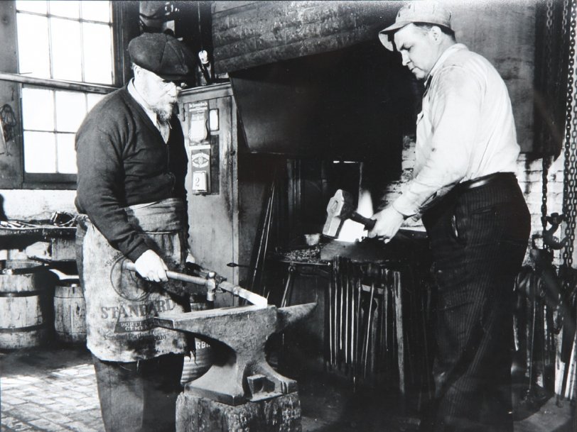 My grandfather Peter Lawrence, left, and his son Harry operated a welding and blacksmith shop in Erie, PA from the 1920s to 1948, when Peter died. They began by shoeing horses, but with the advent of cars, they switched mainly to heating, tempering and sharpening chisels and other steel devices used by the city workers who operated air hammers in street construction and repair. Peter was a native of Riga, Latvia and never learned to drive or to speak English.  
