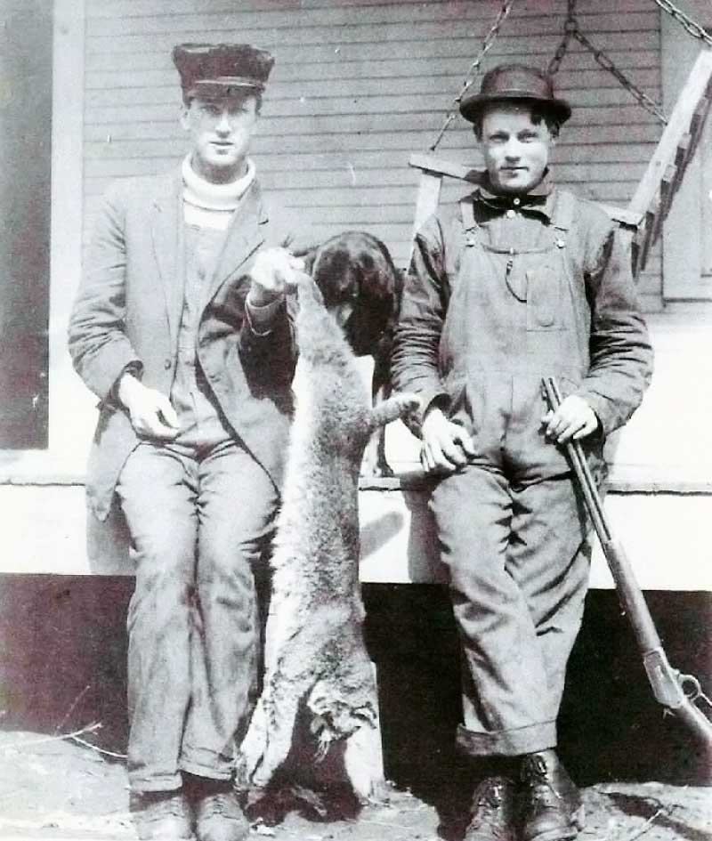 My grandfather, Walton Scites (1883-1945), left, and an unknown friend with a freshly-shot bobcat and nosy dog, taken in Lincoln County, West Virginia, probably around 1905. Bobcats must have been pretty common around there. That was the name of the high school team, and also the downtown restaurant. We still have the Marlin 25-20 Rifle that the friend is holding. It hasn't been fired in 70 years or so. View full size.
