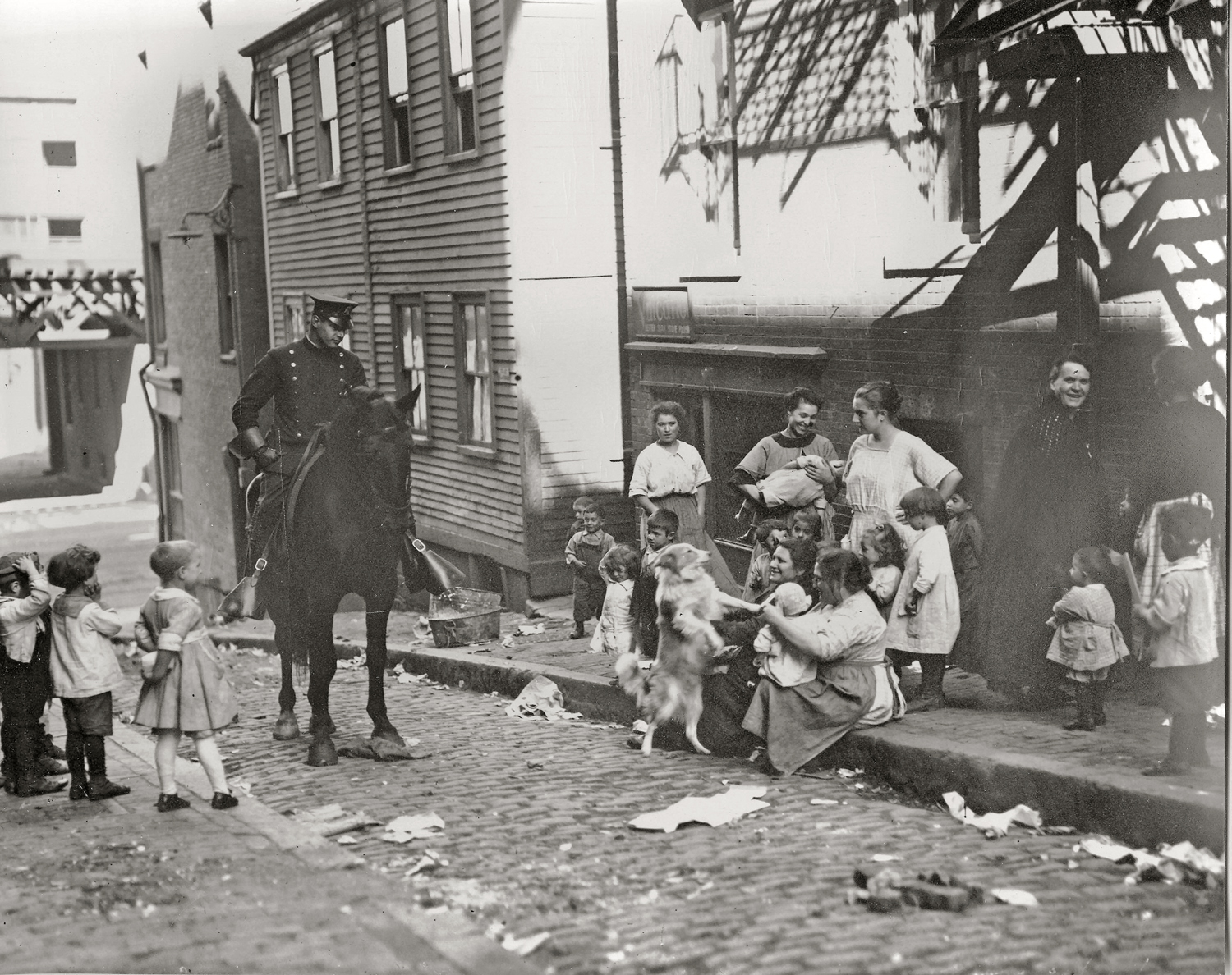 My sister acquired this photo while attending Tufts in the '80s. The photographer was unnamed and the only label said: Boston, 1913. View full size.