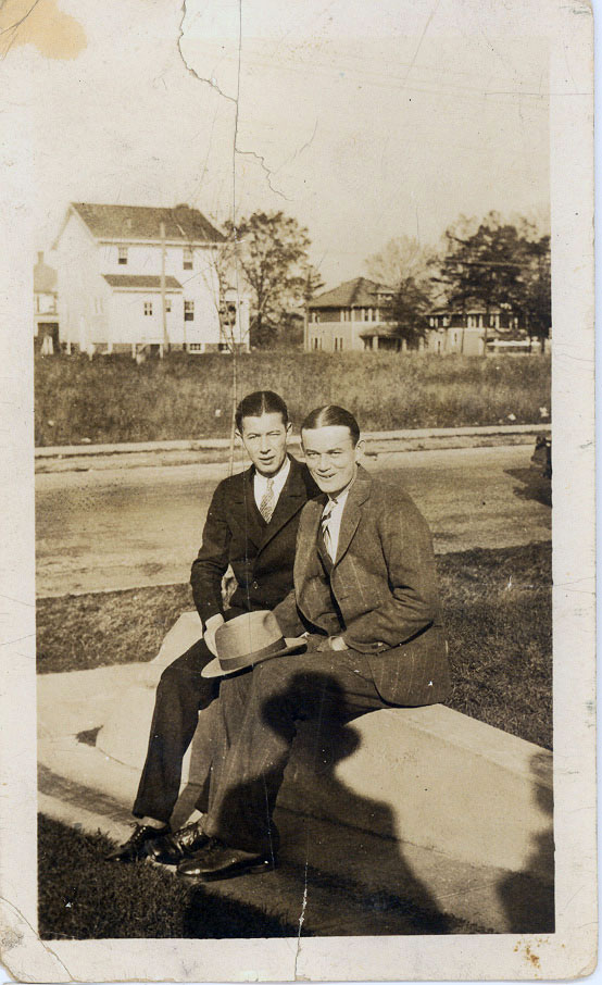 Jack Culp and Brooks Minter sitting in front of Brooks' sister Fanny and Barber C. Palmer's house at 836 Gist Ave Silver Spring, MD, c. 1930. The back of the house in the background is on the 800 block of Sligo across from the county police station. Houses have since sprung up on the other side of Gist.