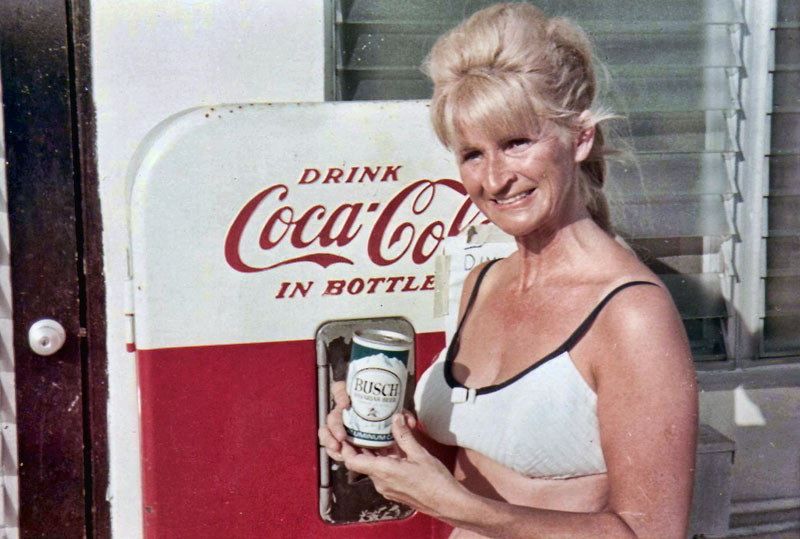This is my mom, Jan, while on vacation in Florida, December 1967, poolside at a now-defunct motel on Gulf Boulevard in St. Pete Beach. We made Florida a regular vacation destination until we moved here in the late '70s. Mom's in front of a classic Coke machine here, but at the moment, apparently her preference was for refreshment of a more grown-up nature. View full size.
