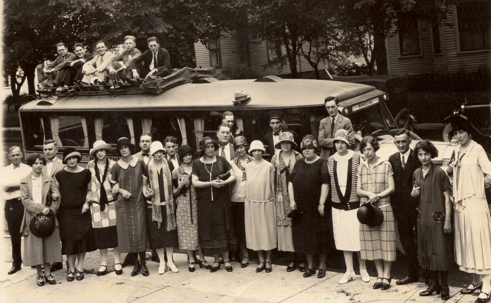 I don't know whom these people are or where they're going. I am thinking most of them look quite young, it could be a high school senior trip, college trip, or could be church youth group trip. The few older folks could be chaperons. This looks to be the late 1920's or early 1930's. I found this picture at a local thrift store, that is all I know. View full size.