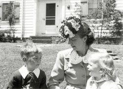 I was still a year away as my brother and sister get ready for Easter 1946 in Rochester, New York. View full size.
What a lovely picture!I love the Easter hat.  It's a shame no one really wears them anymore. What part of Rochester was the house in?
(ShorpyBlog, Member Gallery)