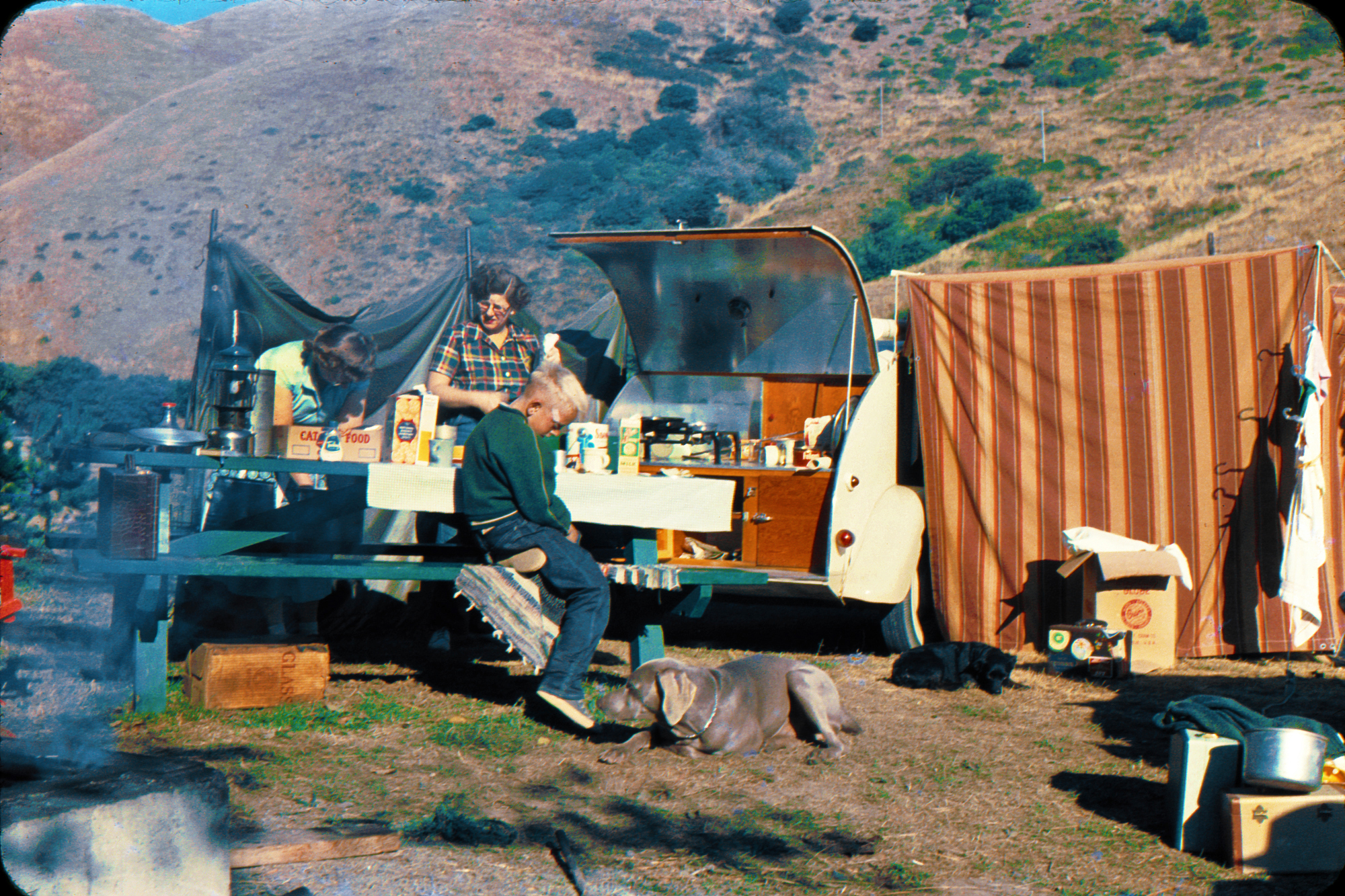 Bill Bliss and his family again, enjoying a little outdoor cooking sometime in the mid-fifties. I'm not sure where this is  but I'm guessing somewhere up the Pacific coast. 35mm Anscochrome color slide. Here's another photo of their trip. View full size.