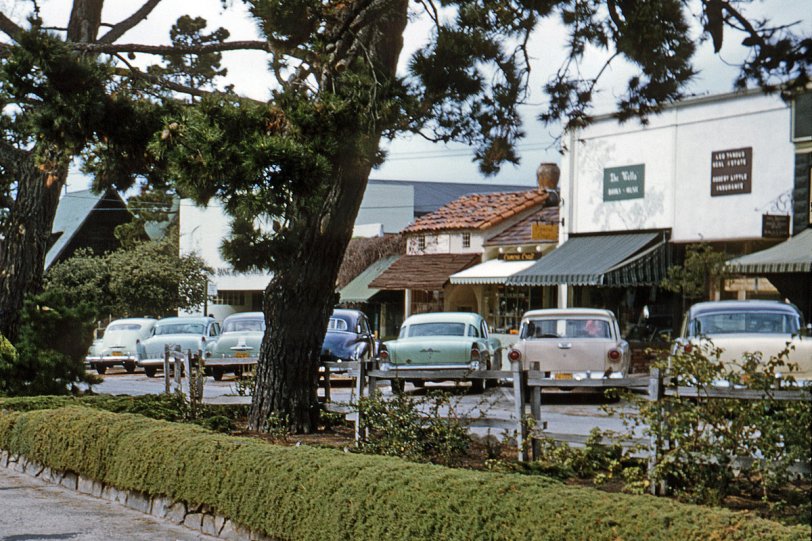 A selection of automobile rear ends in Carmel, California in 1958. The prize, in my opinion, is the two-tone green-on-green 1957 Buick with the divided rear window in the center. A detail from a Kodachrome slide taken by my brother-in-law. View full size.
